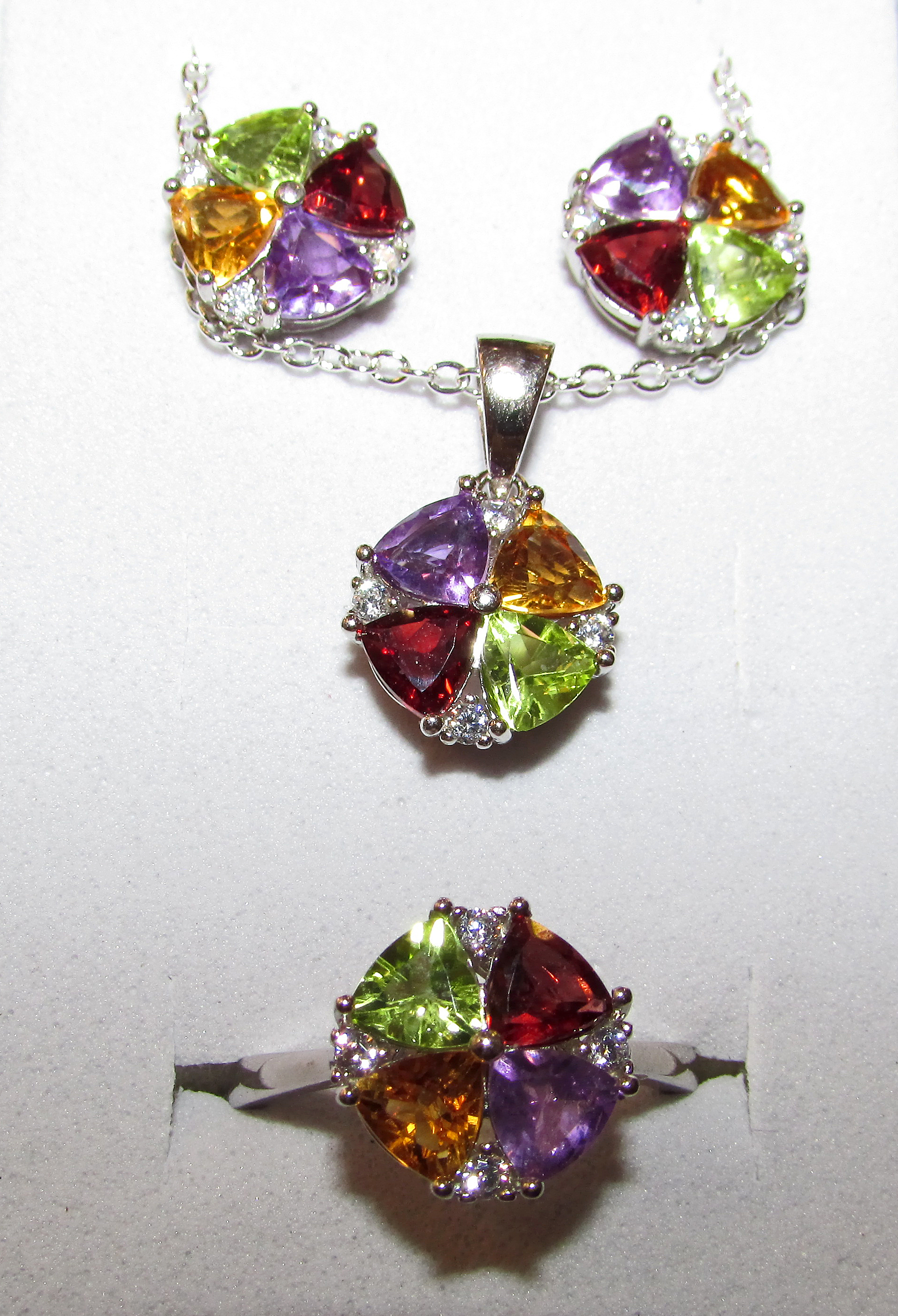 Set with citrine, amethyst, peridot and garnet