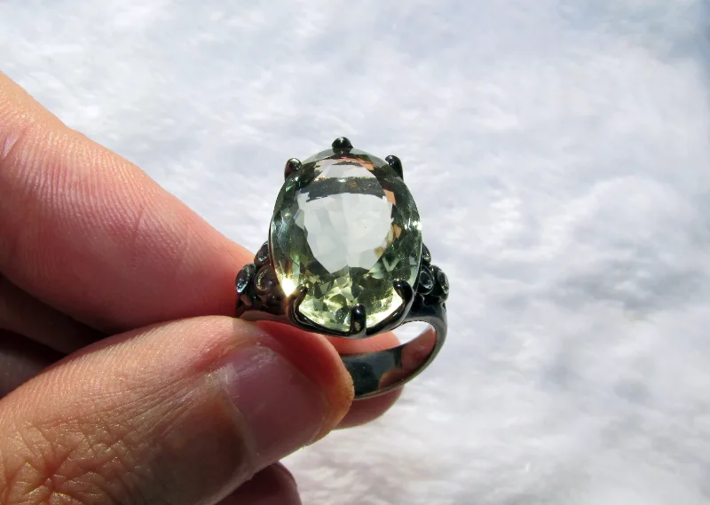 925 sterling silver ring with 14 carat green amethyst