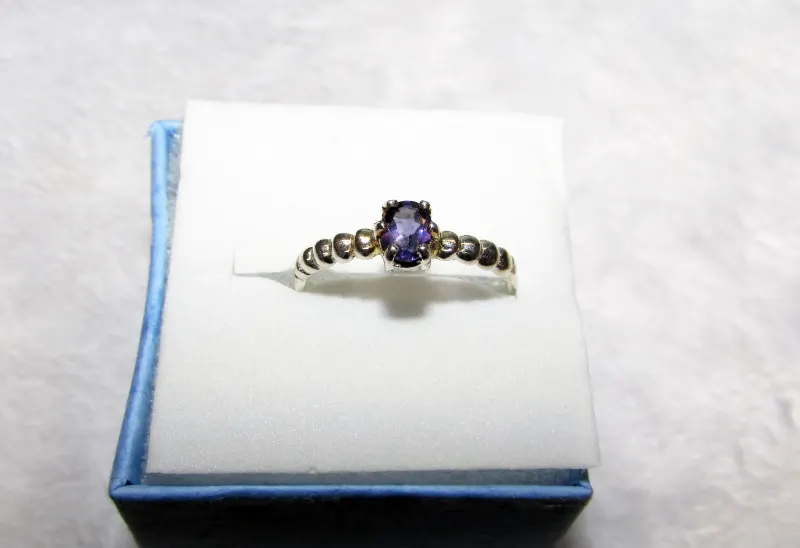 925 sterling silver ring with a small iolite